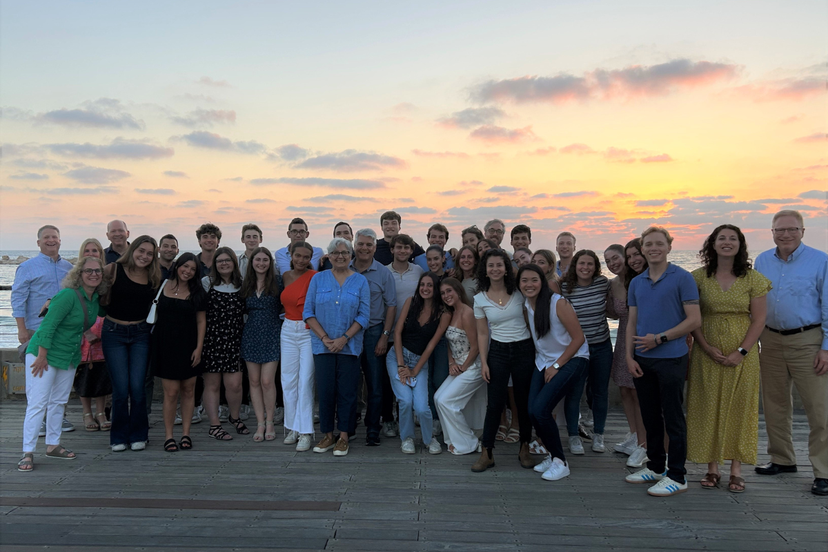 2023 Israel delegation poses with students in Tel Aviv